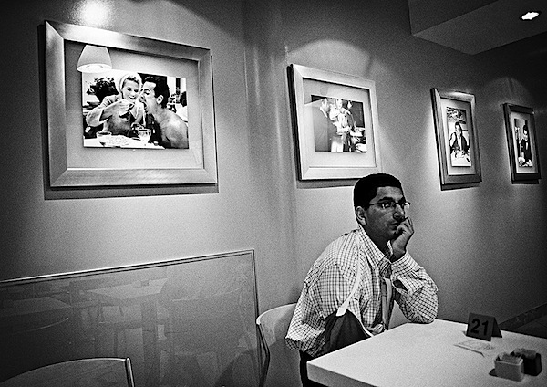 person sitting alone at a table