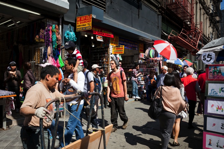 man working outside market