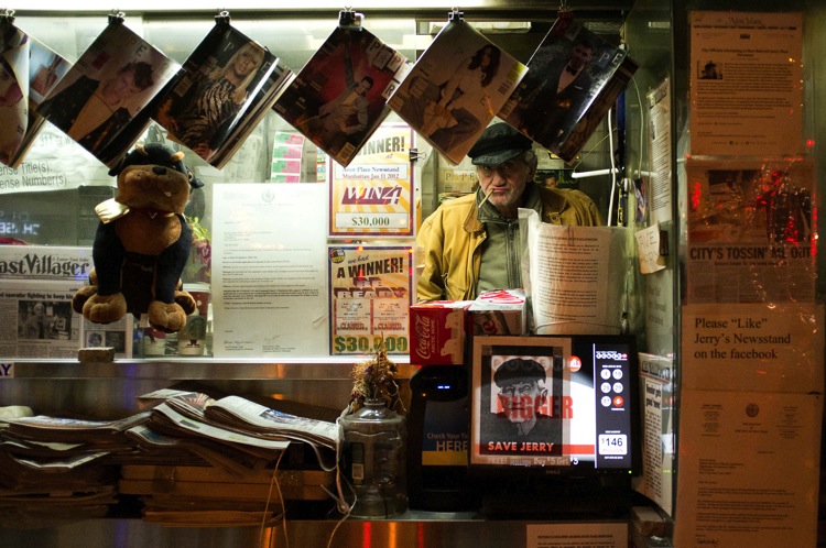 man at a newsstand 