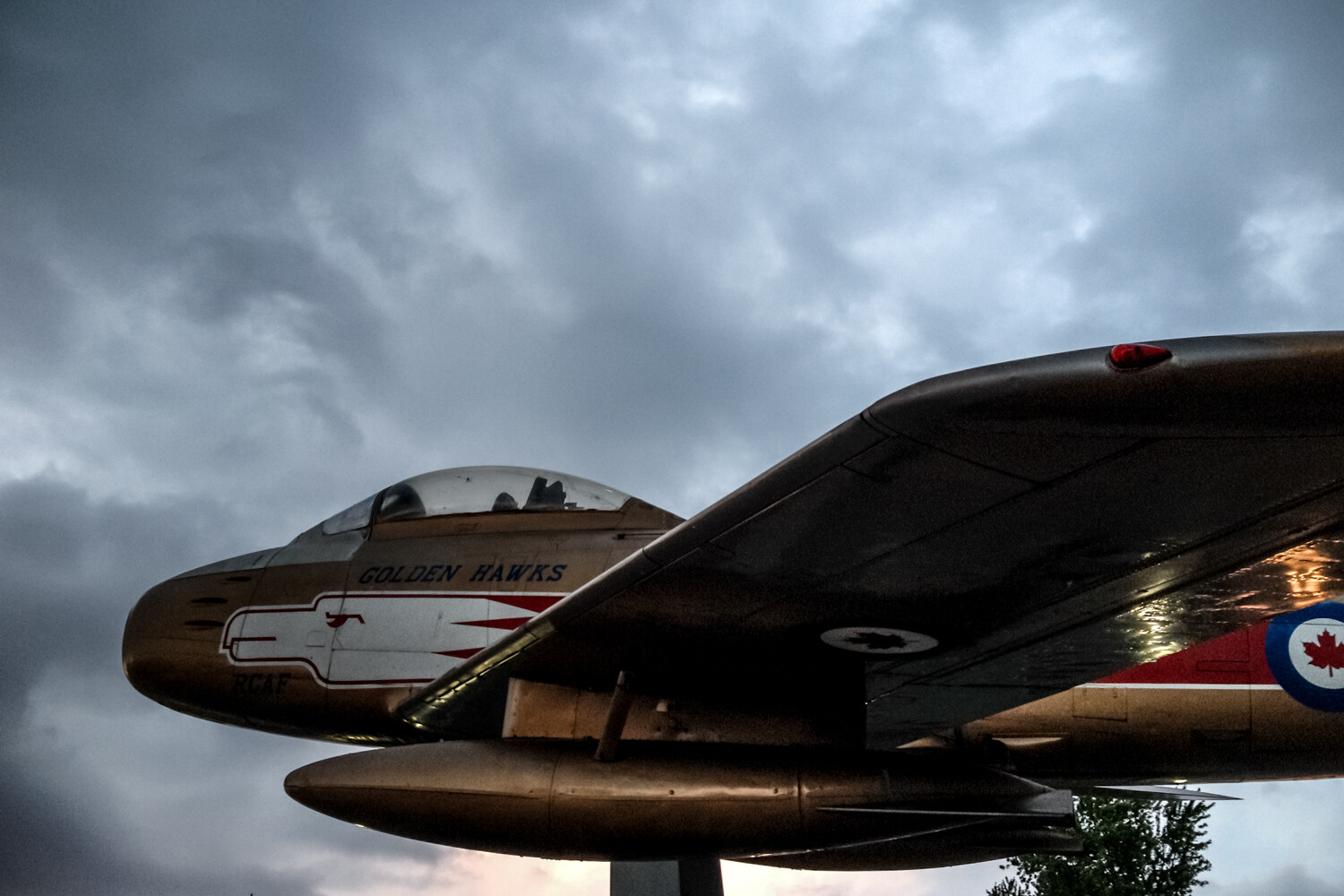 airplane against a stormy sky